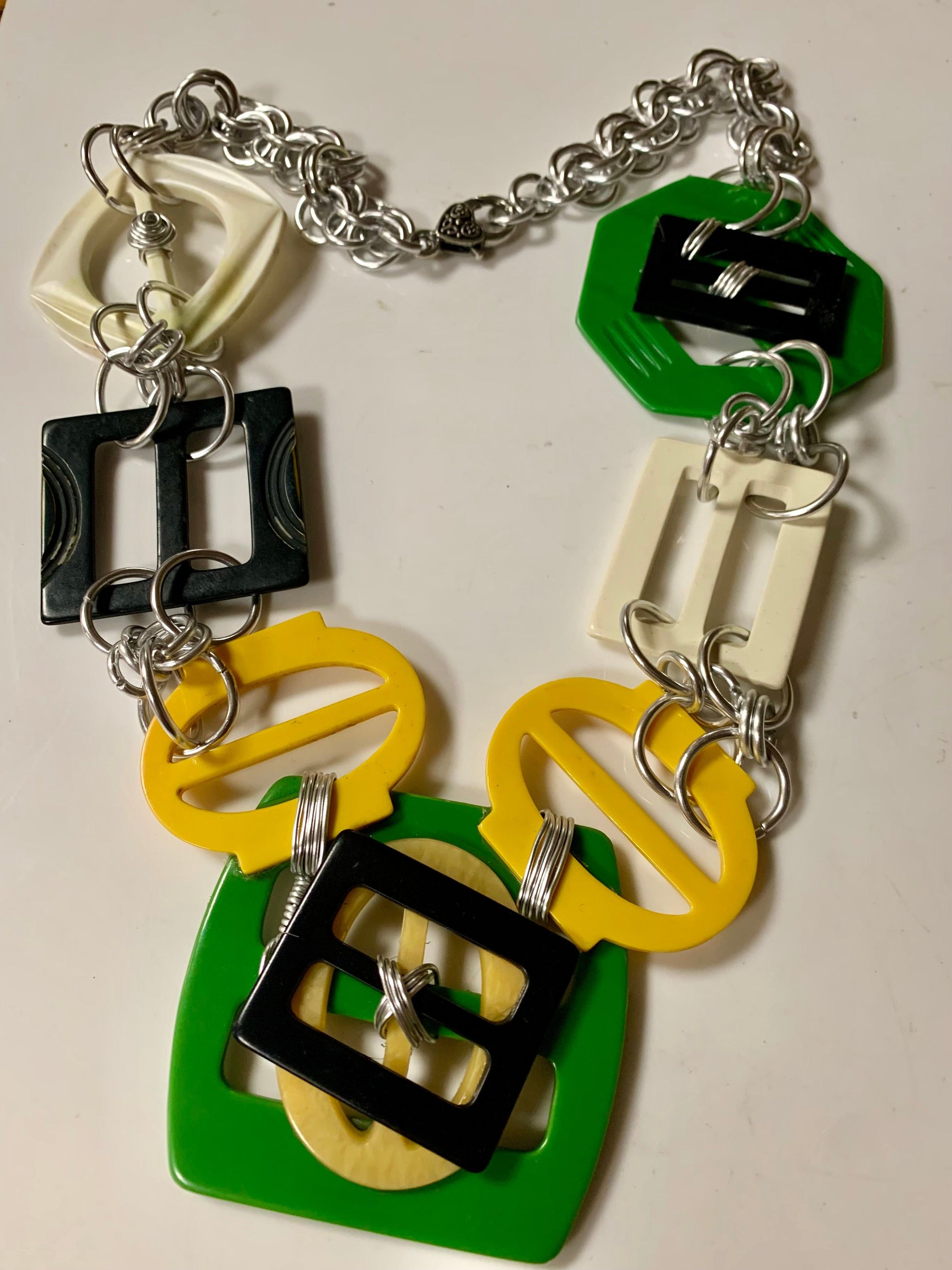 Belt buckle necklace with colorful geometric shapes