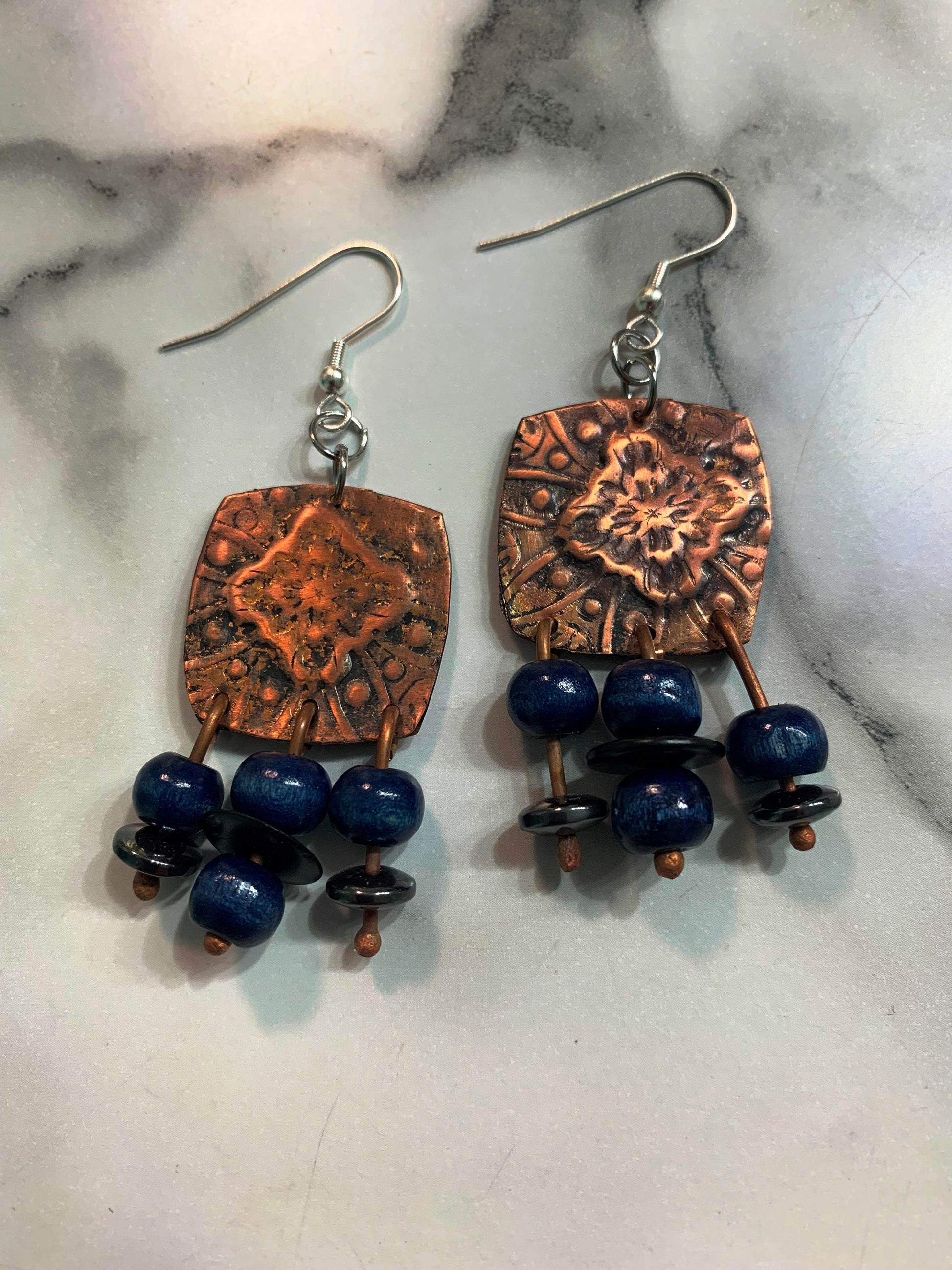 Bursts Copper earrings with blue beads