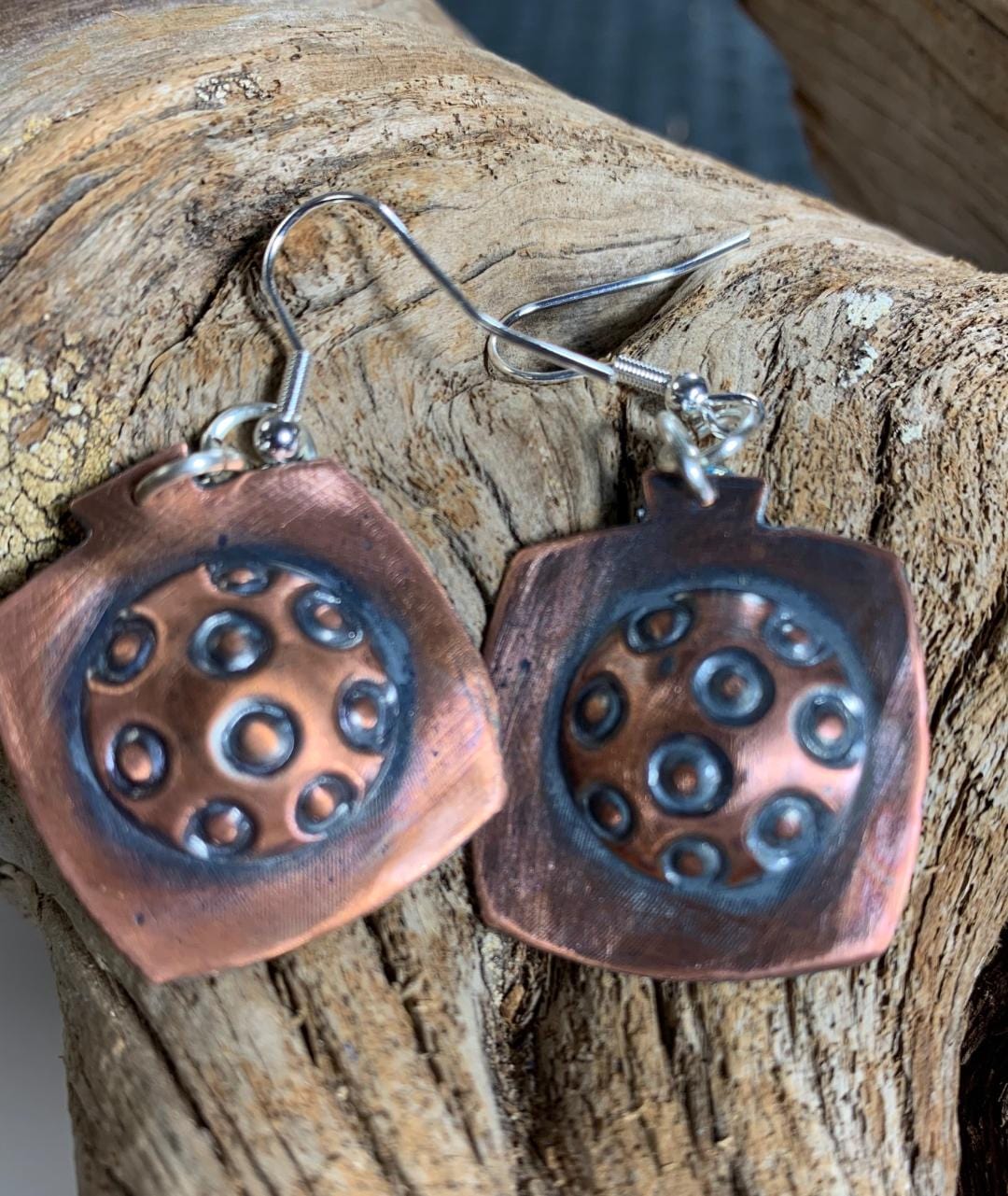 Copper earrings with circle within design