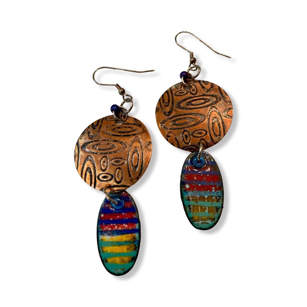 Colorful layered earrings with copper and striped enamel.