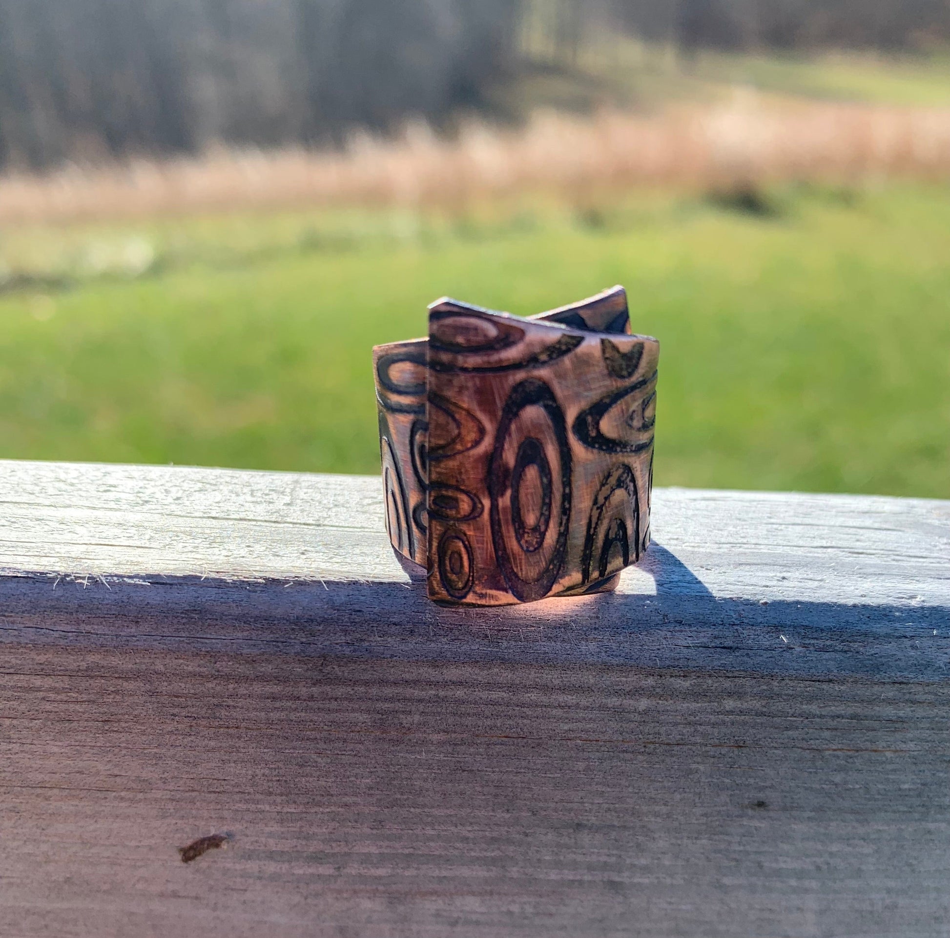 Copper band ring with circle design