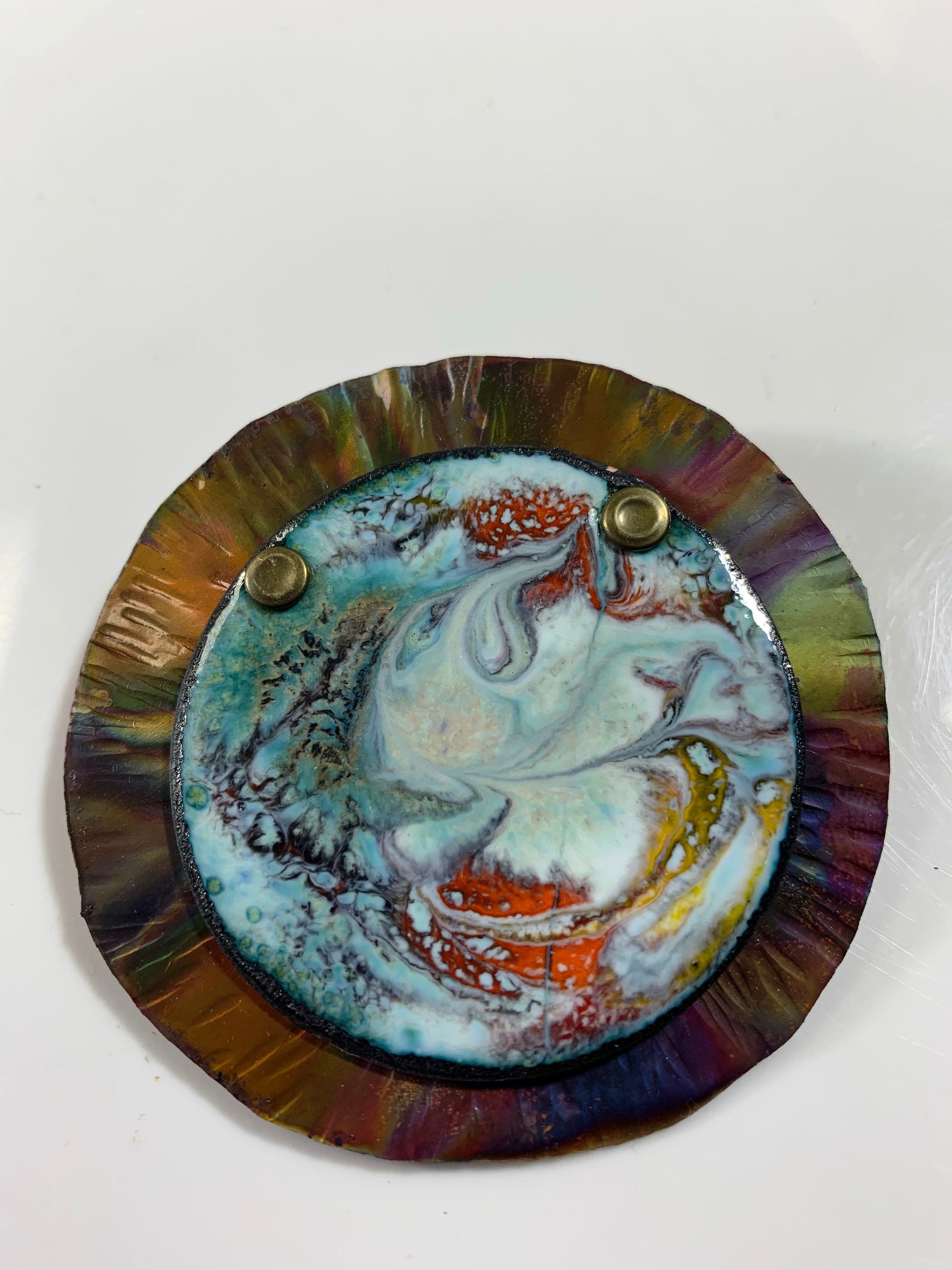 DreamState enamel art with swirling colors