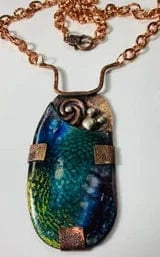 ExplodingEnergy artisan necklace with vibrant colors and copper chain.