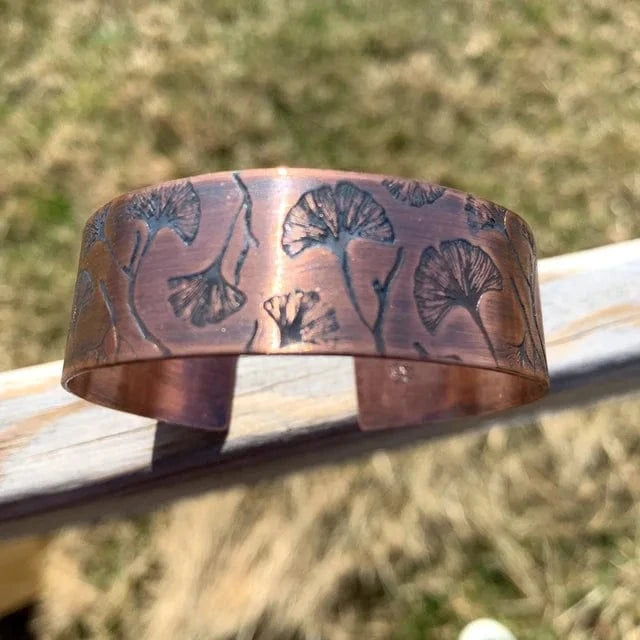 Copper cuff bracelet with etched floating ginkgo leaves