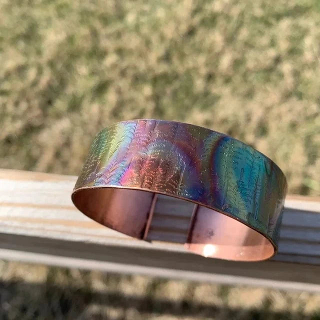 Iridescent metal bracelet, part of the ForestForTheTrees collection.