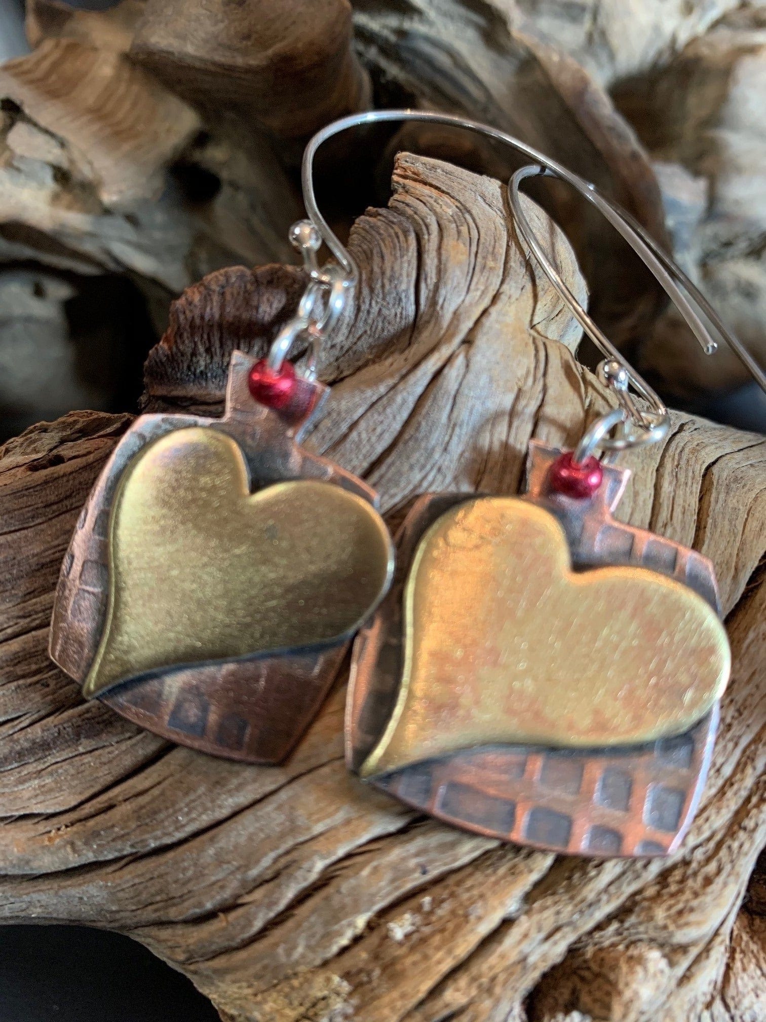 Large brass heart earrings