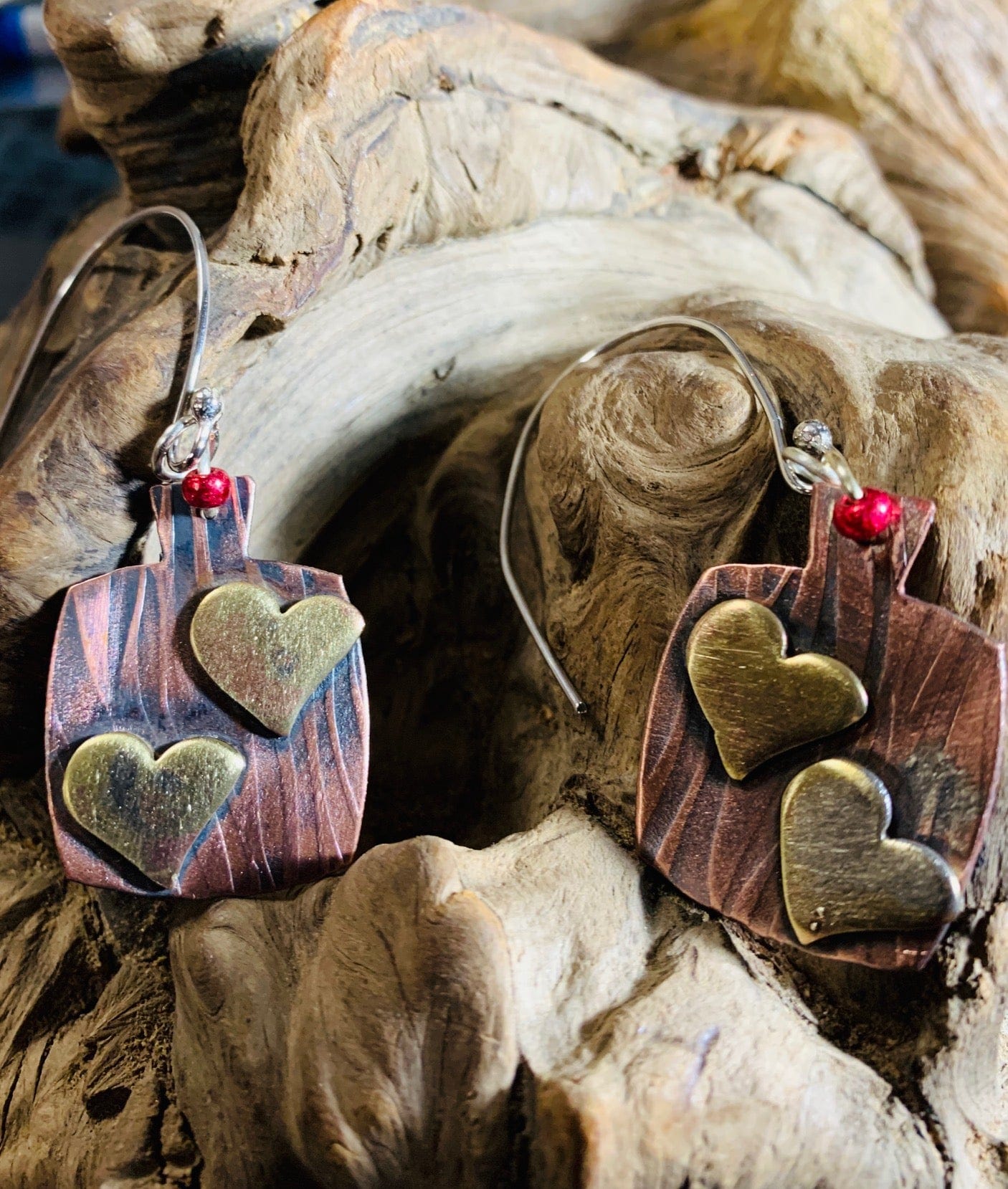 SmBrassHearts earrings with heart accents