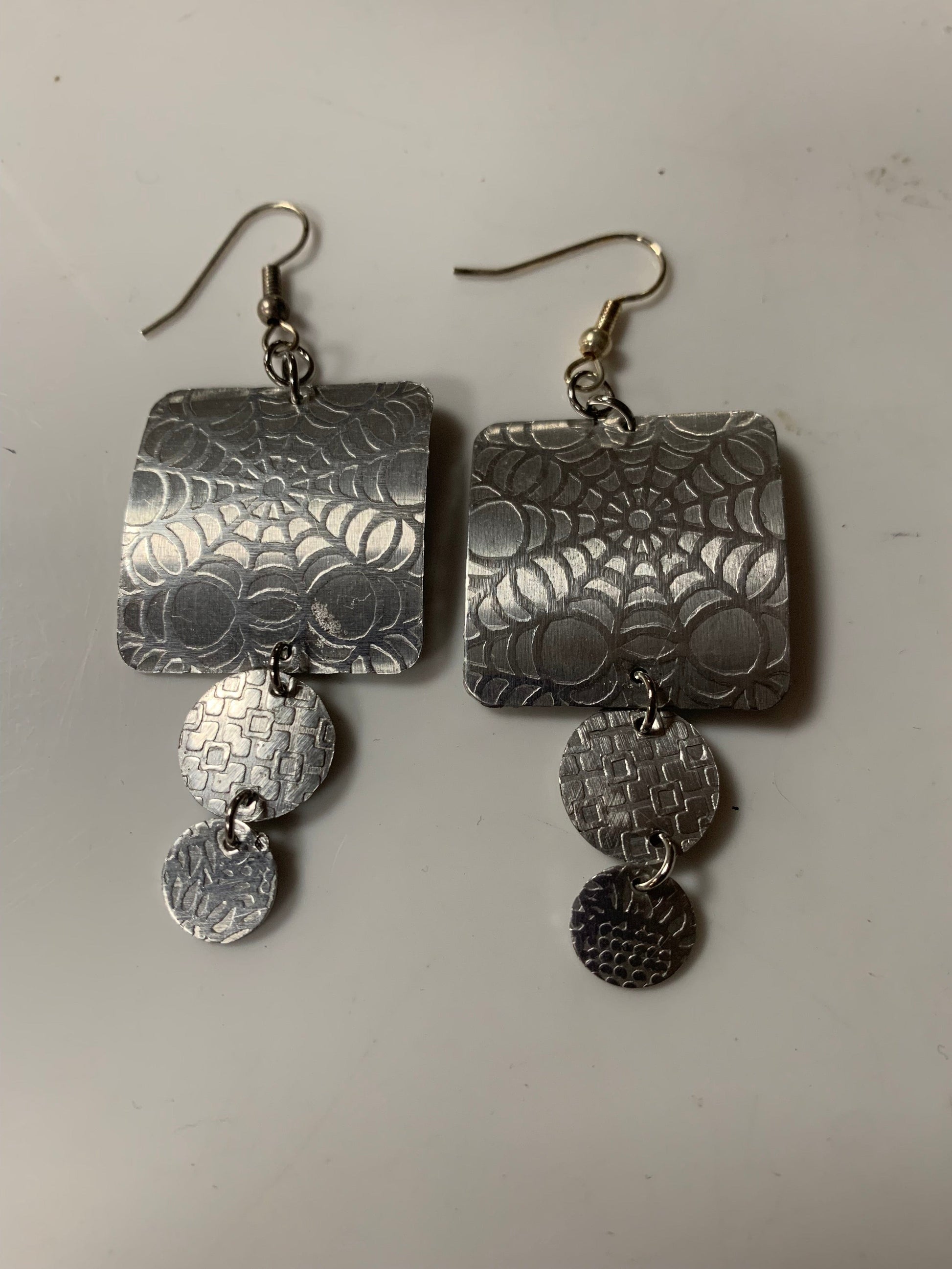 Spider web earrings