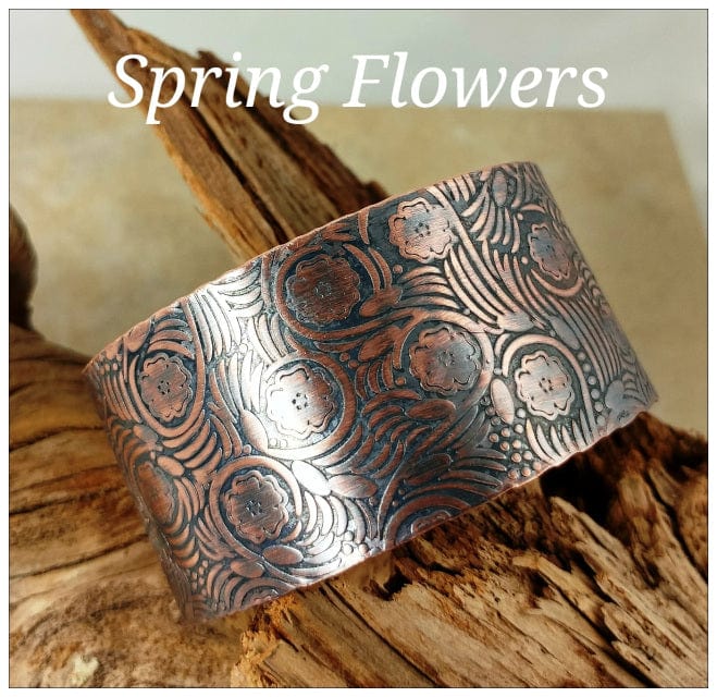 Copper bracelet with spring flower pattern