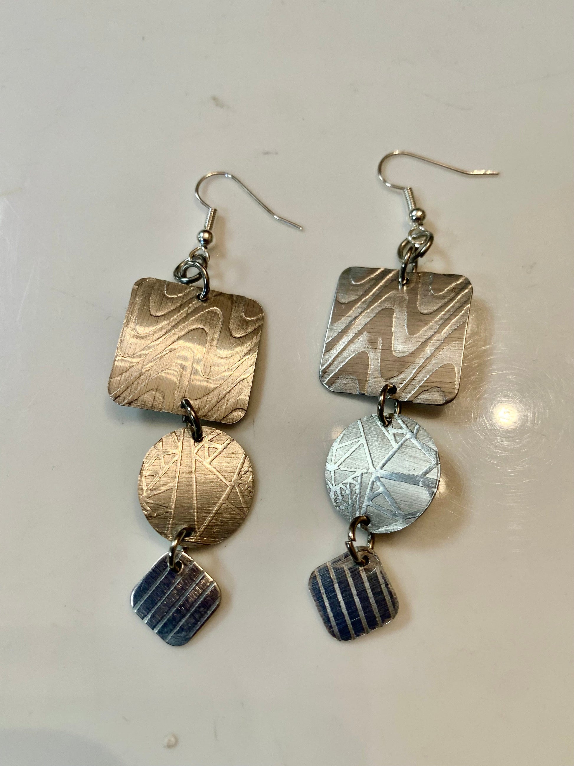 Three layered metal earrings