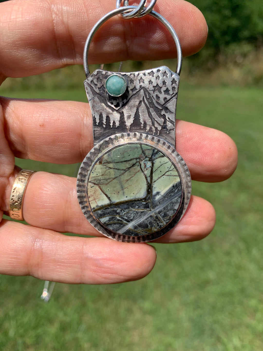 One-of-a-kind Green Maligano Jasper pendant with handcrafted silver mountains forest and Turquoise moon