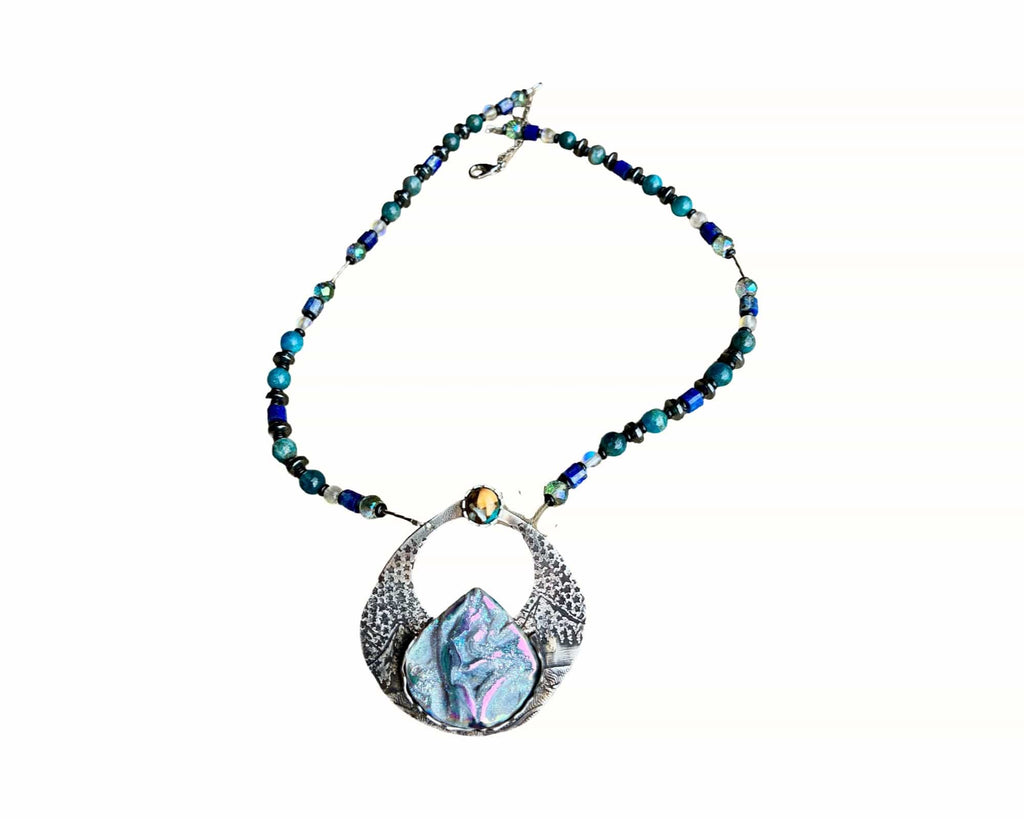 Full view of Alpenglow Titanium Coquina necklace with handcrafted apatite lapis onyx hematite and Aurora gemstone chain