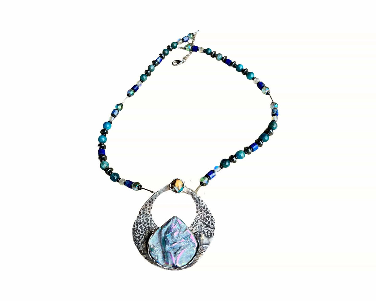 Full view of Alpenglow Titanium Coquina necklace with handcrafted apatite lapis onyx hematite and Aurora gemstone chain