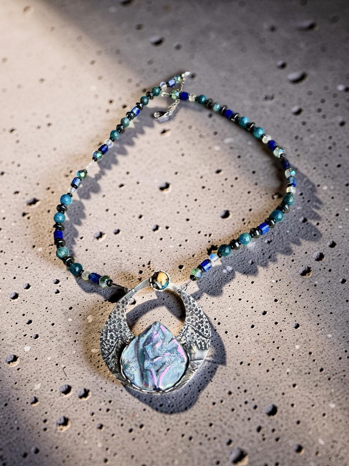 Alpenglow | One of a Kind Sterling Silver Mountain Necklace | Titanium Treated Coquina