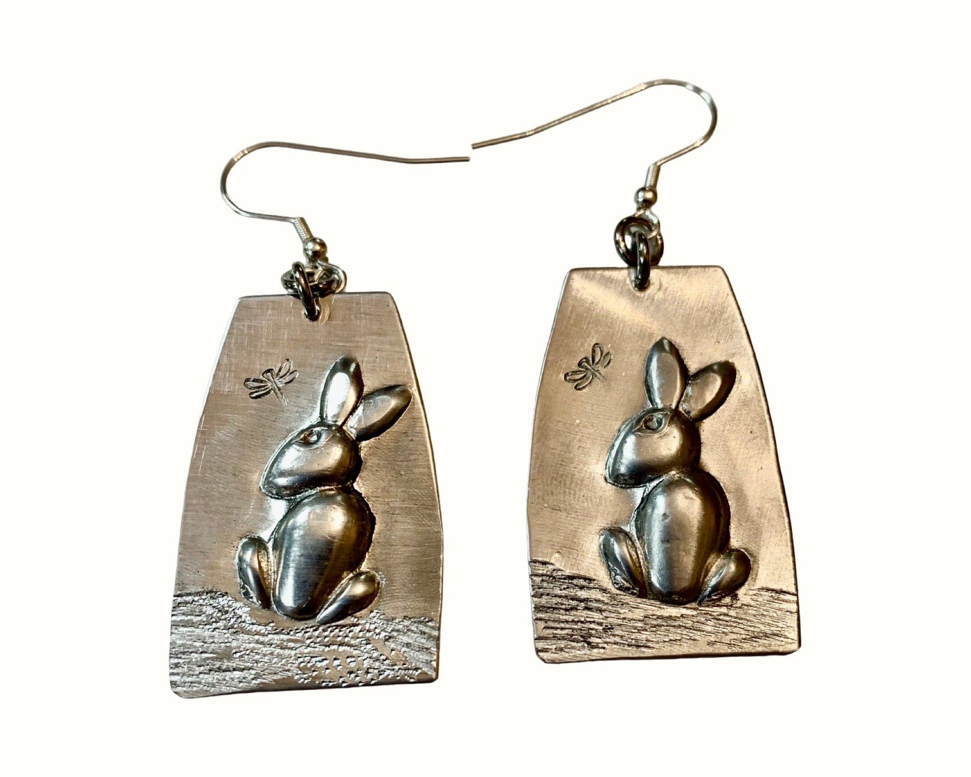 Aluminum rabbit earrings on a white background