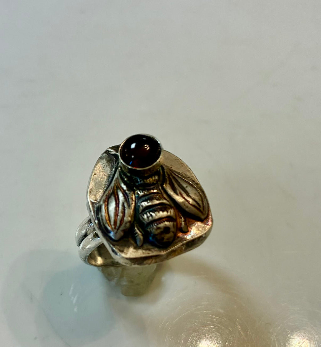 Heart of the Hive size 9 sterling silver bee ring with natural red garnet handcrafted by Christine Keller of Chrizart Creations