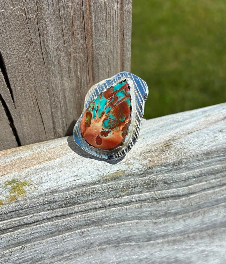 One-of-a-kind sterling silver ring with a rare Blue Wood Opal with turquoise blue and earthy red tones, handcrafted by Christine Keller in size 7.