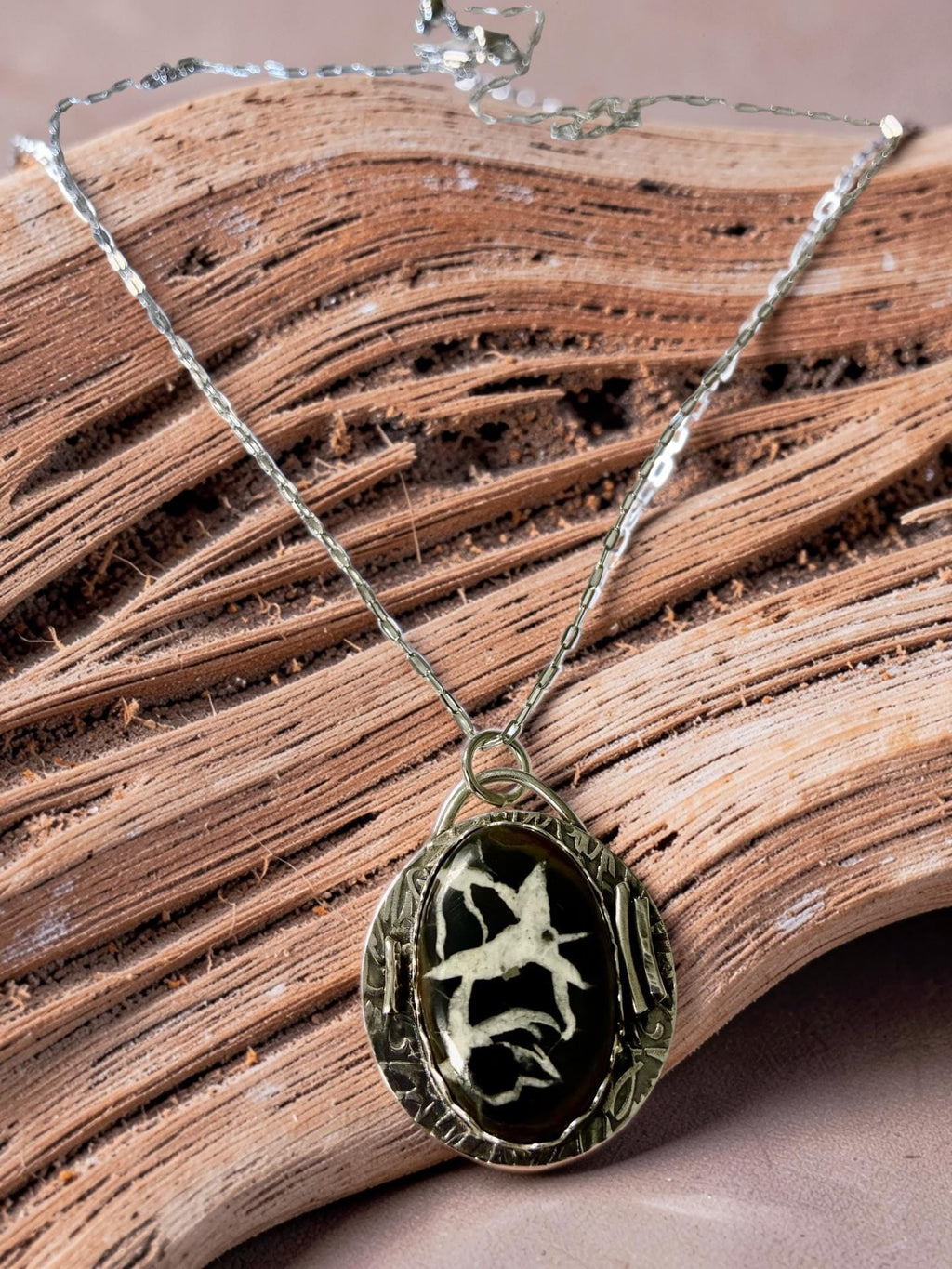 White Heron one-of-a-kind Septarian pendant handcrafted in sterling silver on a 24-inch adjustable silver chain.