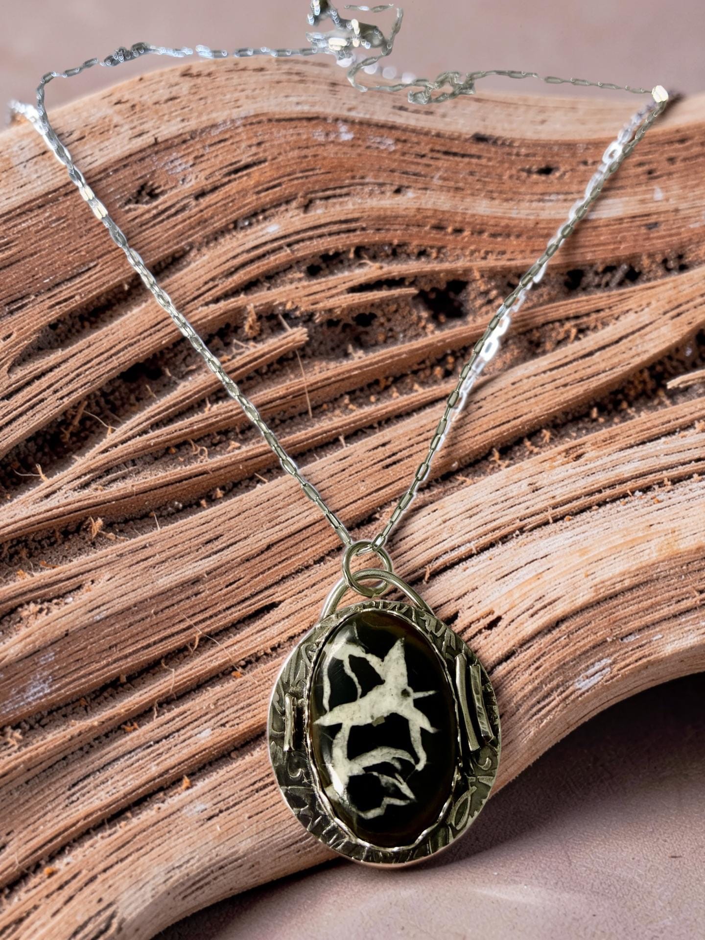 White Heron one-of-a-kind Septarian pendant handcrafted in sterling silver on a 24-inch adjustable silver chain.