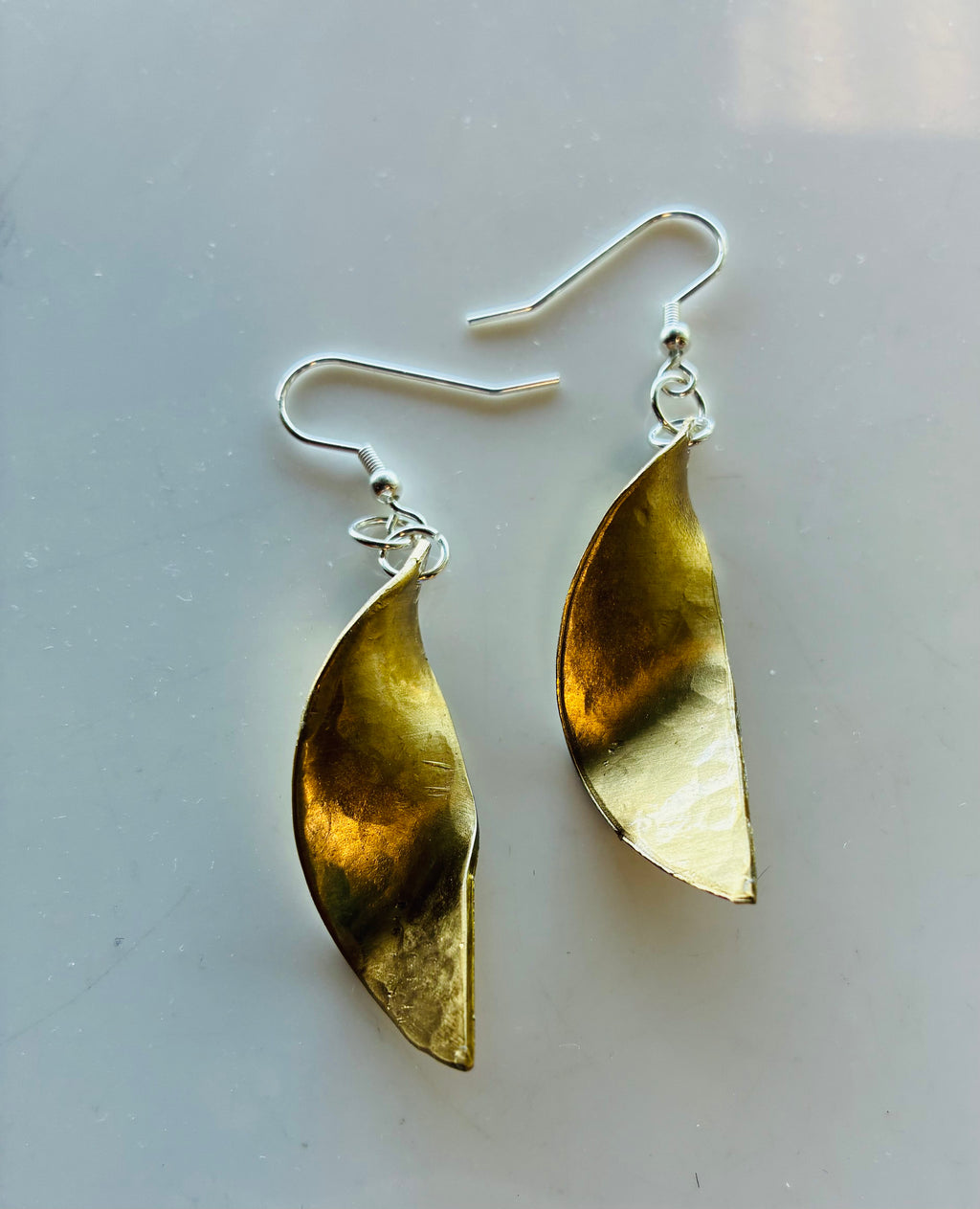 Golden Twist sculptural jeweler's brass earrings hand formed and sealed with a protective finish by Christine Keller of Chrizart Creations