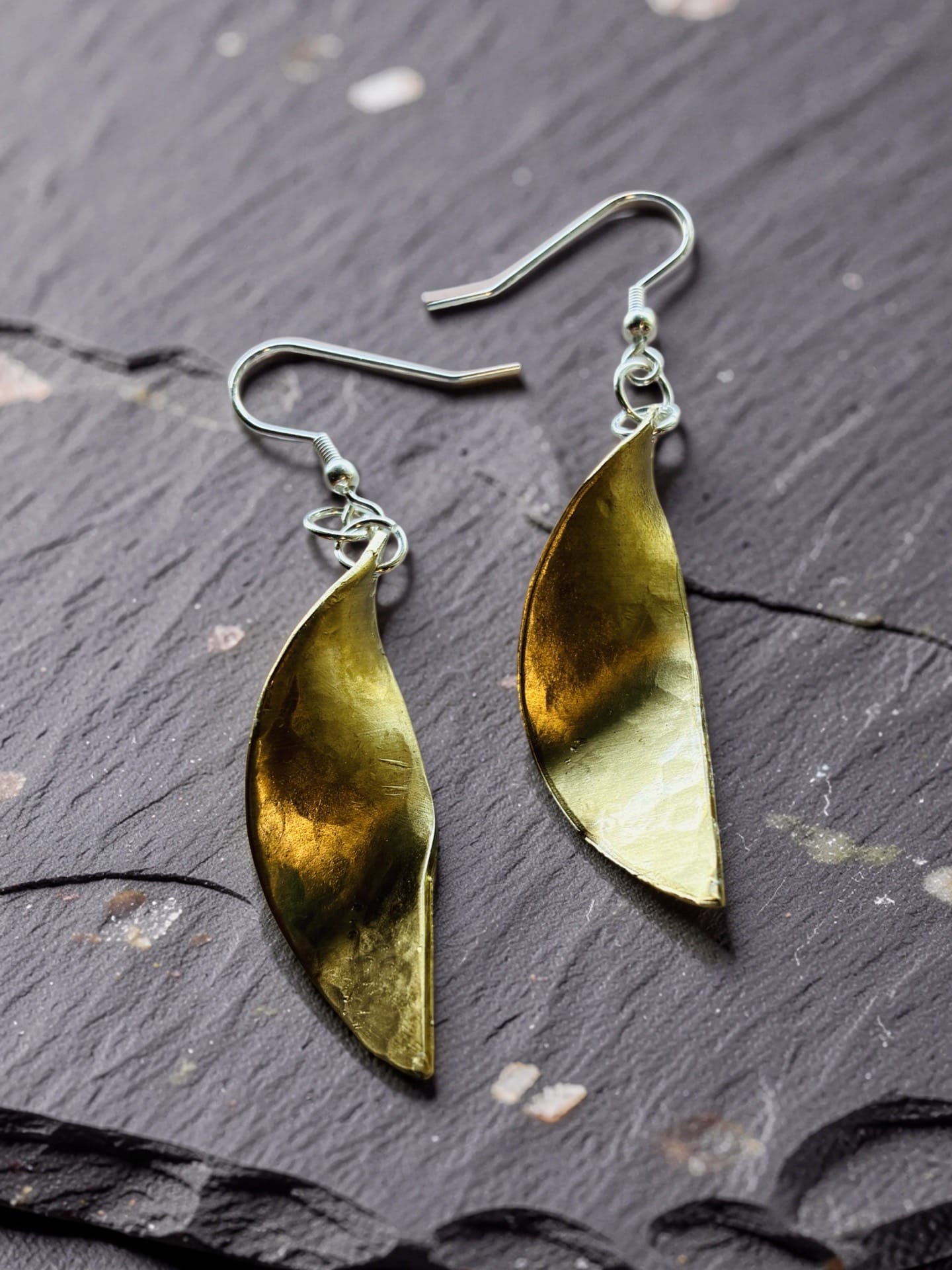 Golden Twist sculptural jeweler's brass earrings hand formed and sealed with a protective finish by Christine Keller of Chrizart Creations