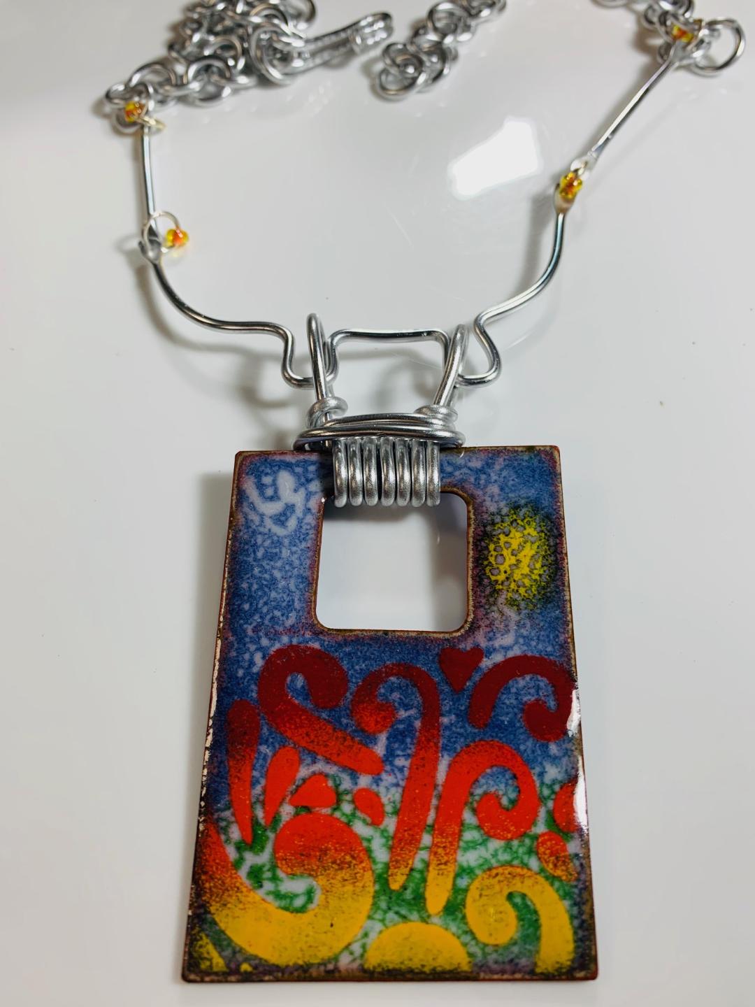 'Bursting Energy' Enamel Pendant in Vibrant Colors