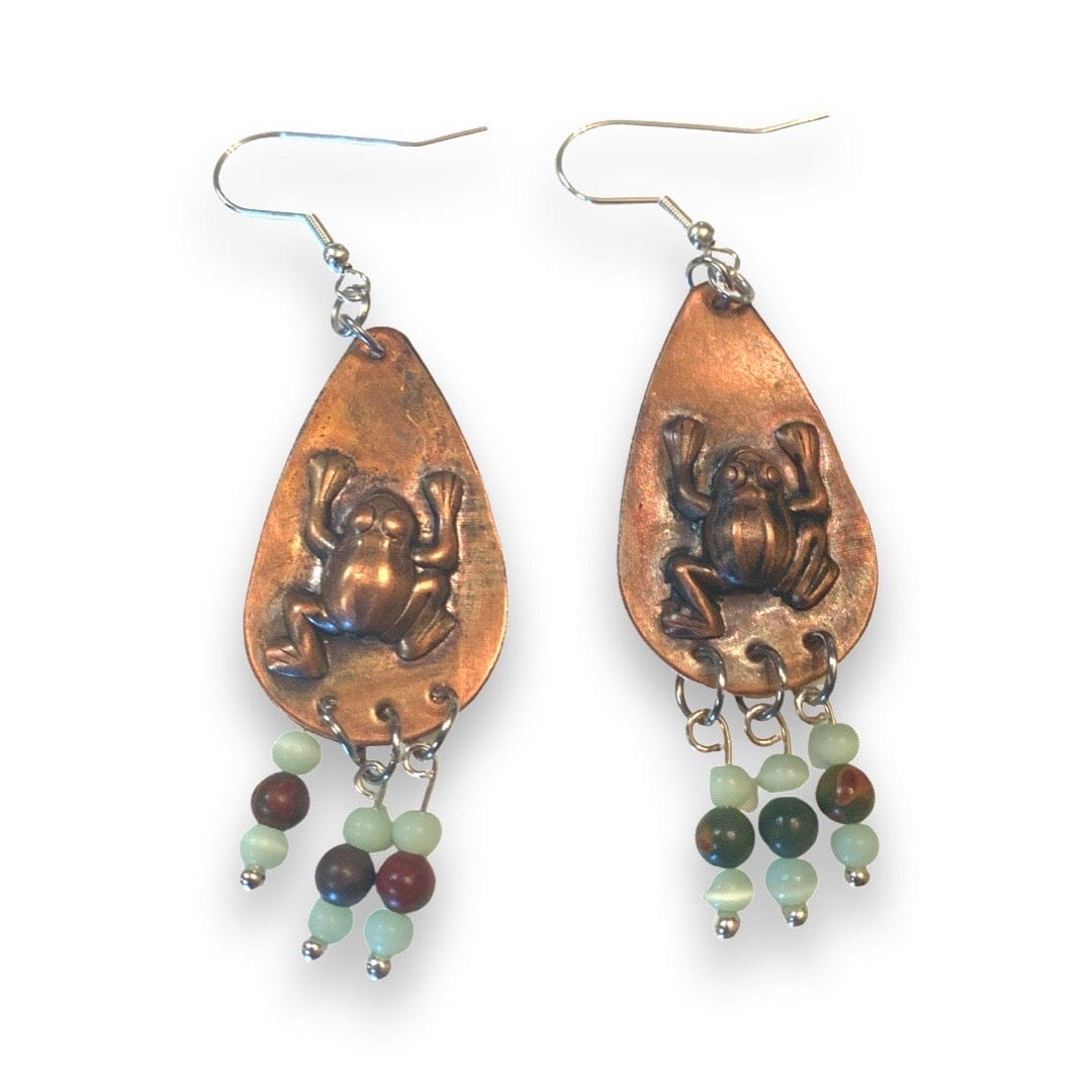 Copper teardrop earrings with frog design and bead accents on a white background