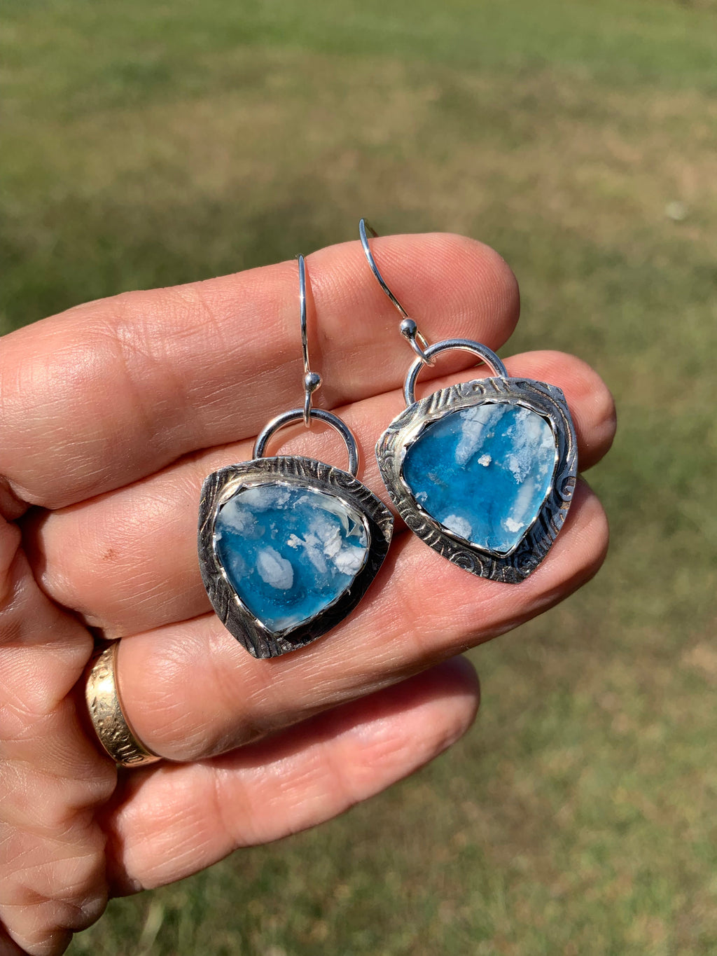 DreamClouds3 earrings in hand