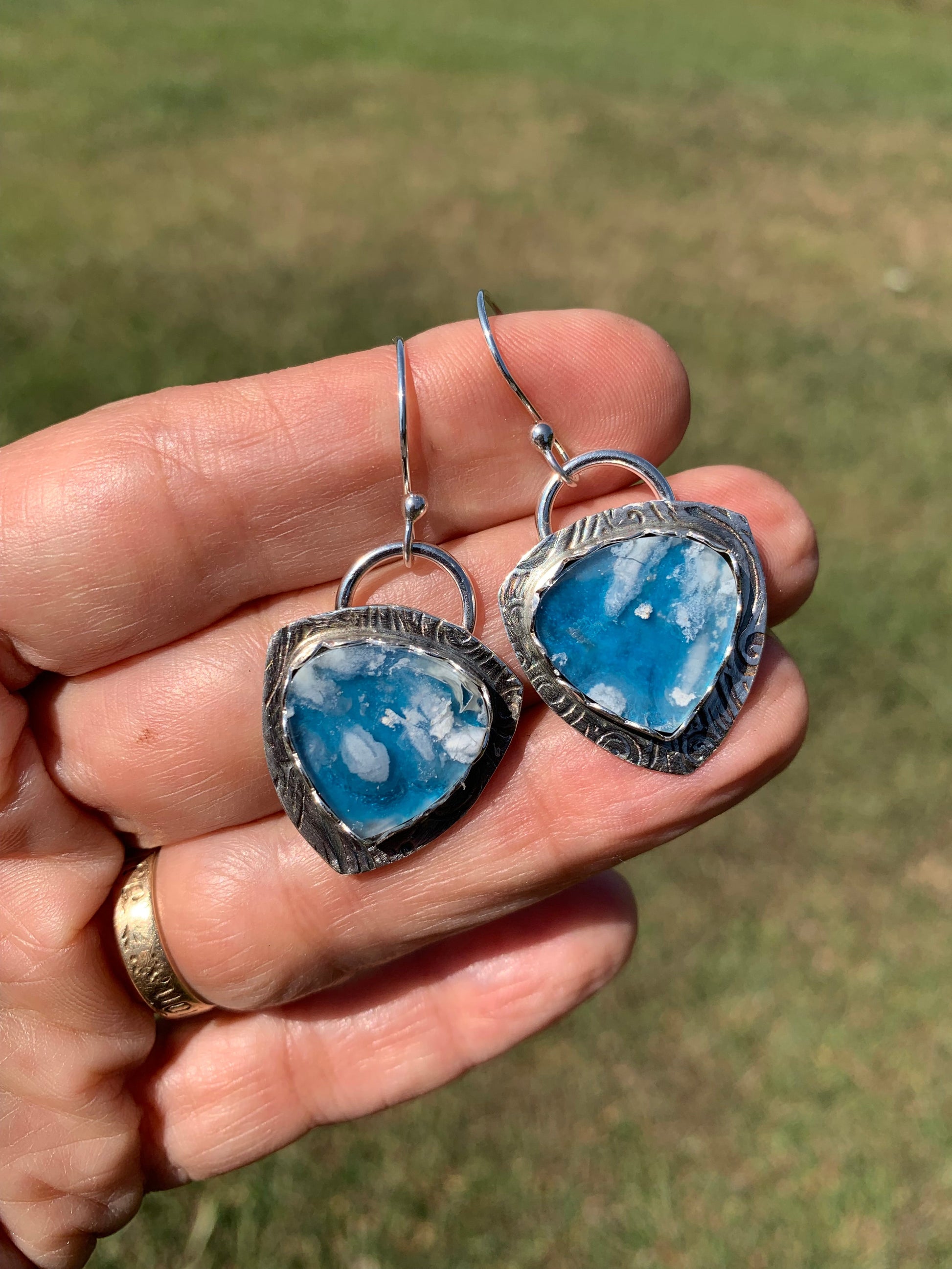DreamClouds3 earrings in hand