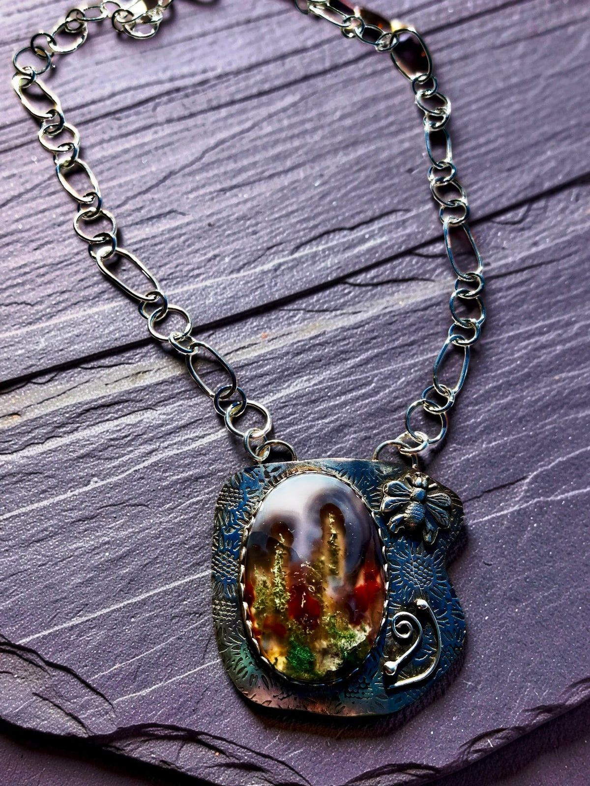 Garden Beyond the Veil by Christine Keller, AA moss agate pendant with handcrafted botanical sterling silver setting and 24-inch handmade silver link chain.