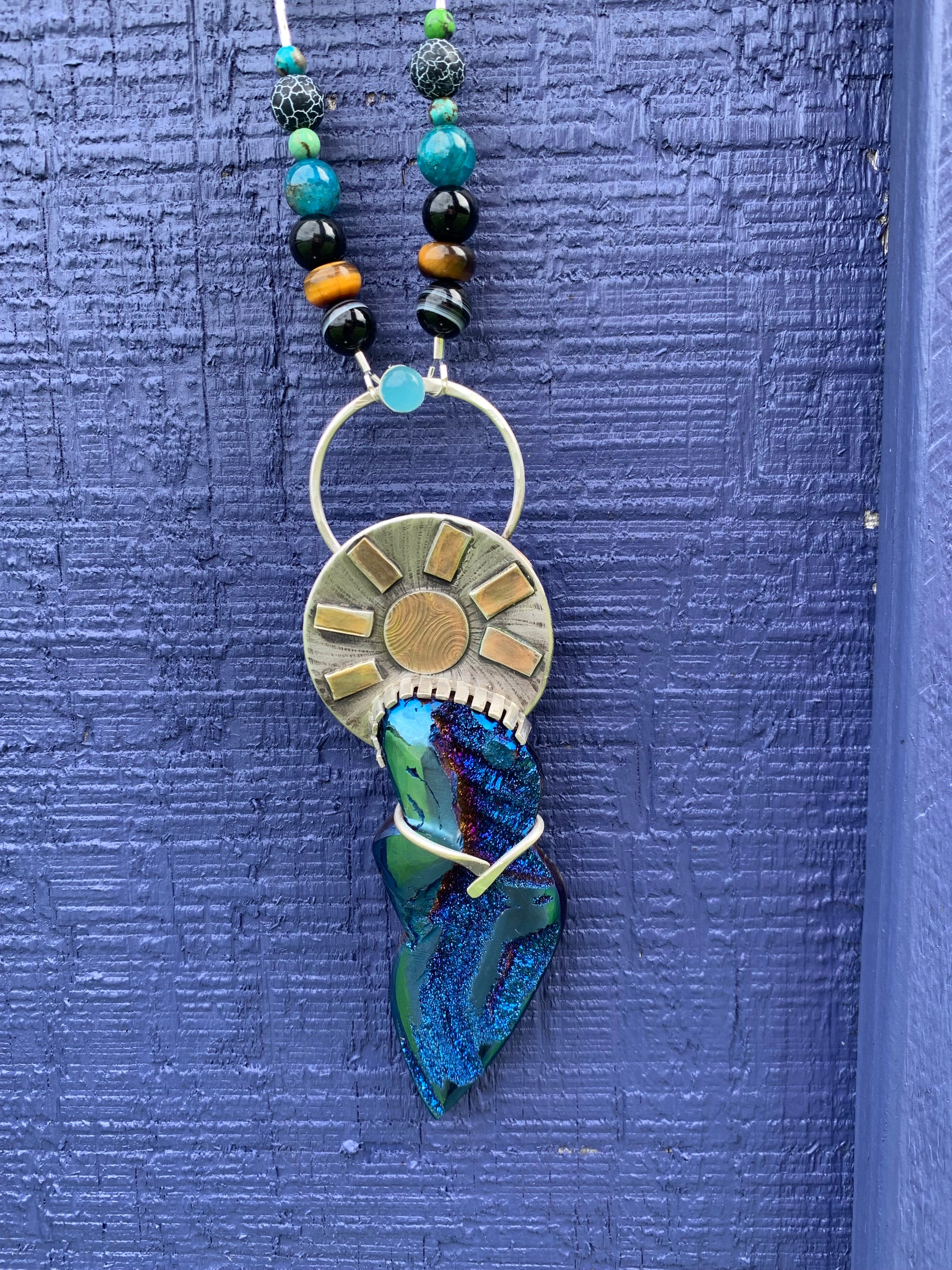 Goddess Pendant necklace with blue and green glass pendant.