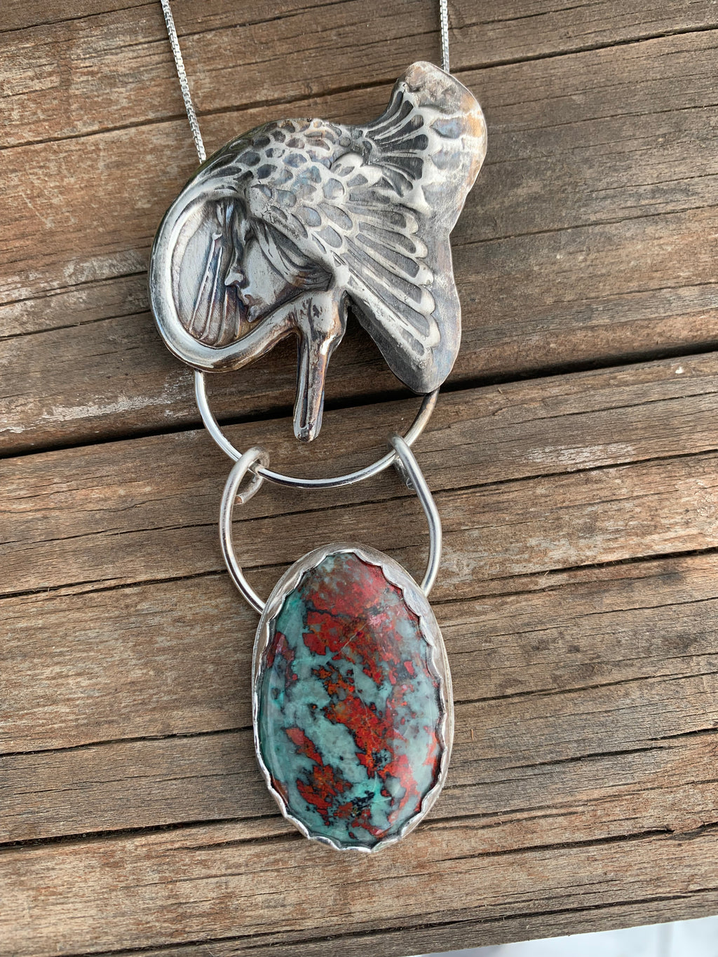 Goddess Under Wing necklace with turquoise stone