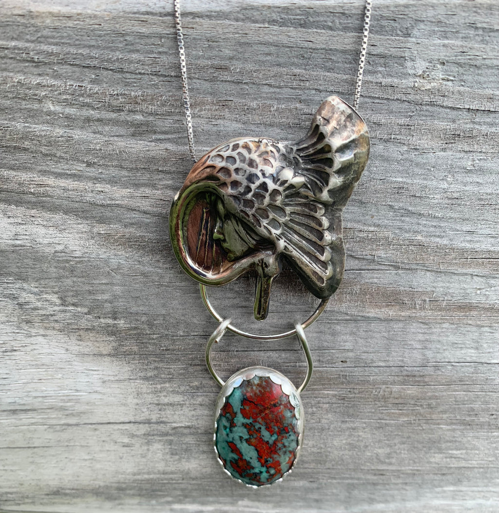 Goddess Under Wing pendant necklace with turquoise stone