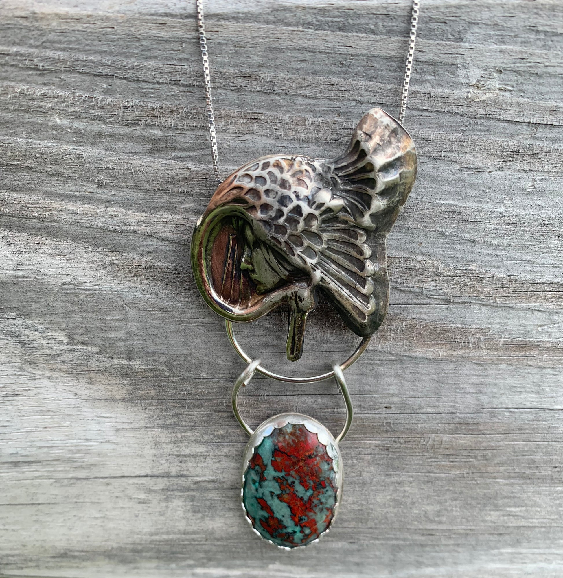 Goddess Under Wing pendant necklace with turquoise stone