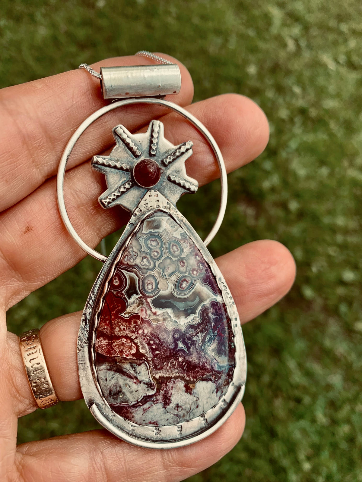 Keeper of Secrets one-of-a-kind Mexican Lace Agate goddess pendant handcrafted in sterling silver by jewelry artist Christine Keller.