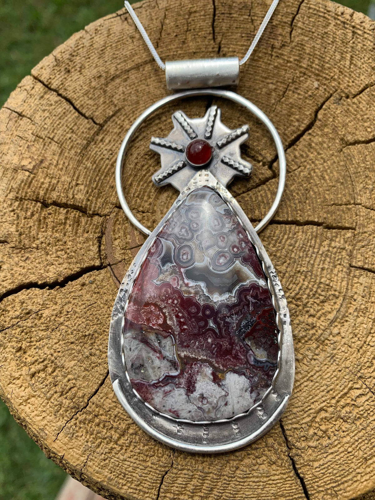 Keeper of Secrets one-of-a-kind Mexican Lace Agate goddess pendant handcrafted in sterling silver by jewelry artist Christine Keller.