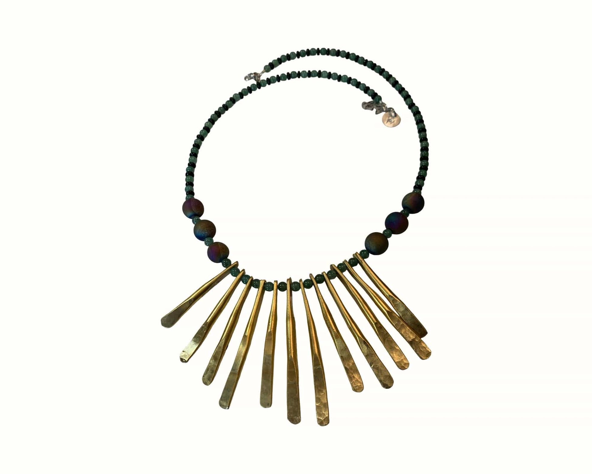 Necklace with stone beads and  brass fringe on a white background