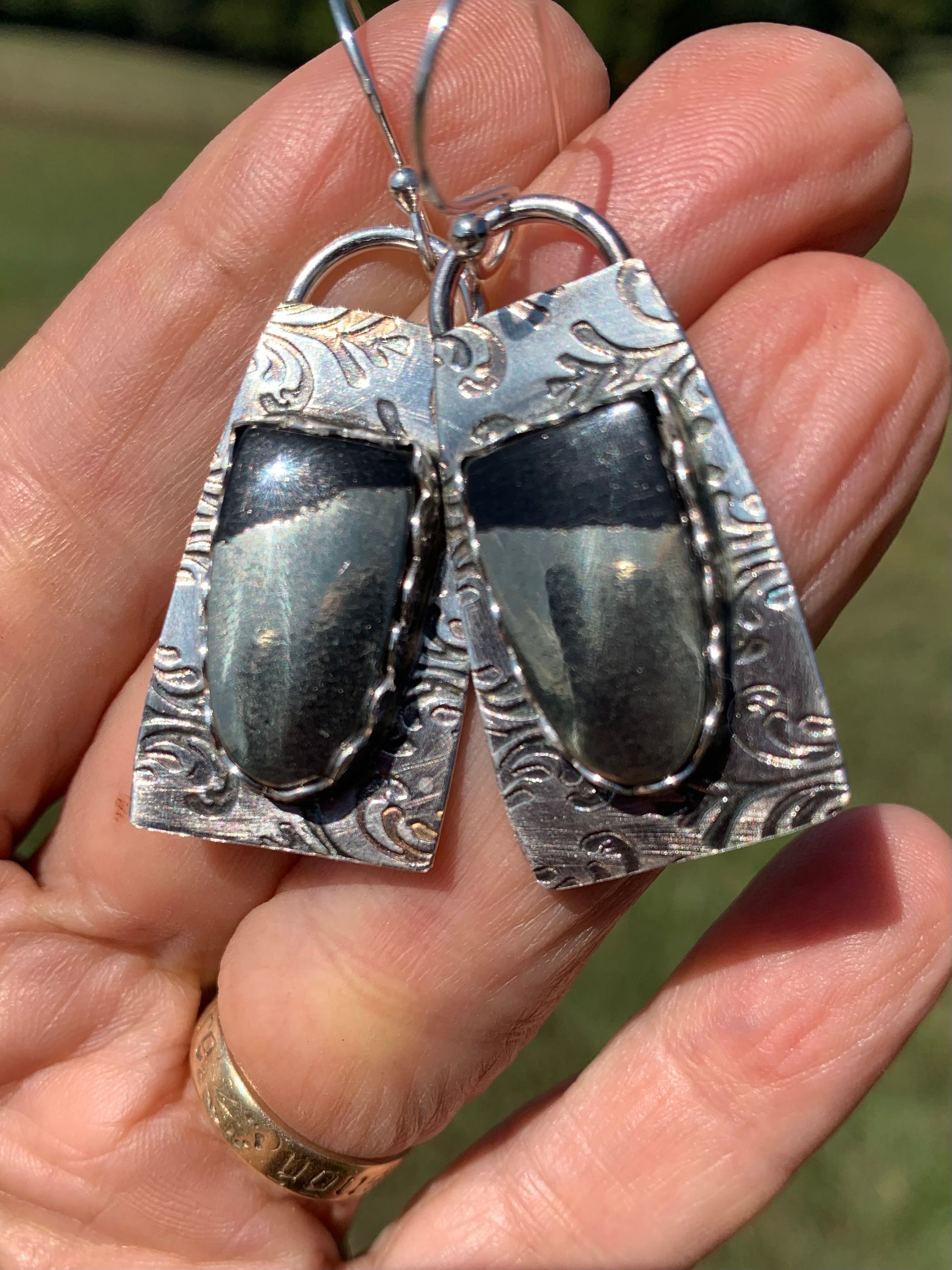 Hematite earrings with silver filigree