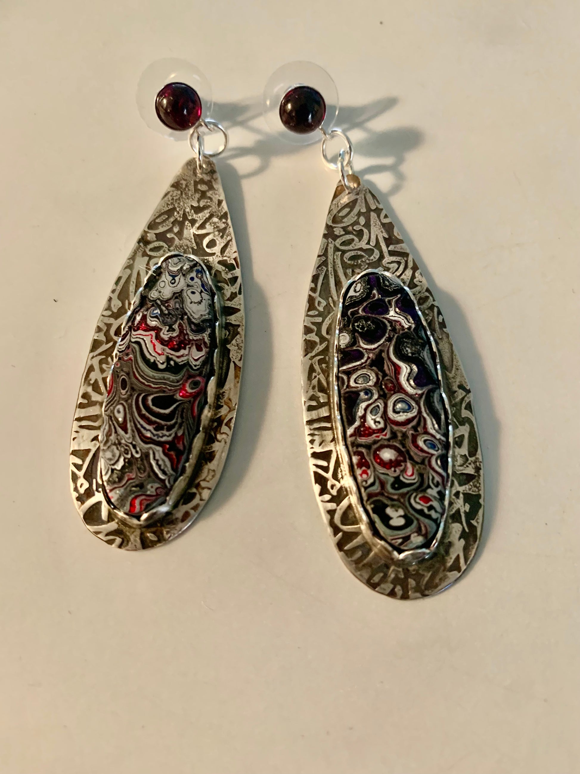 Fordite and Garnet Post Earrings in Fine Silver