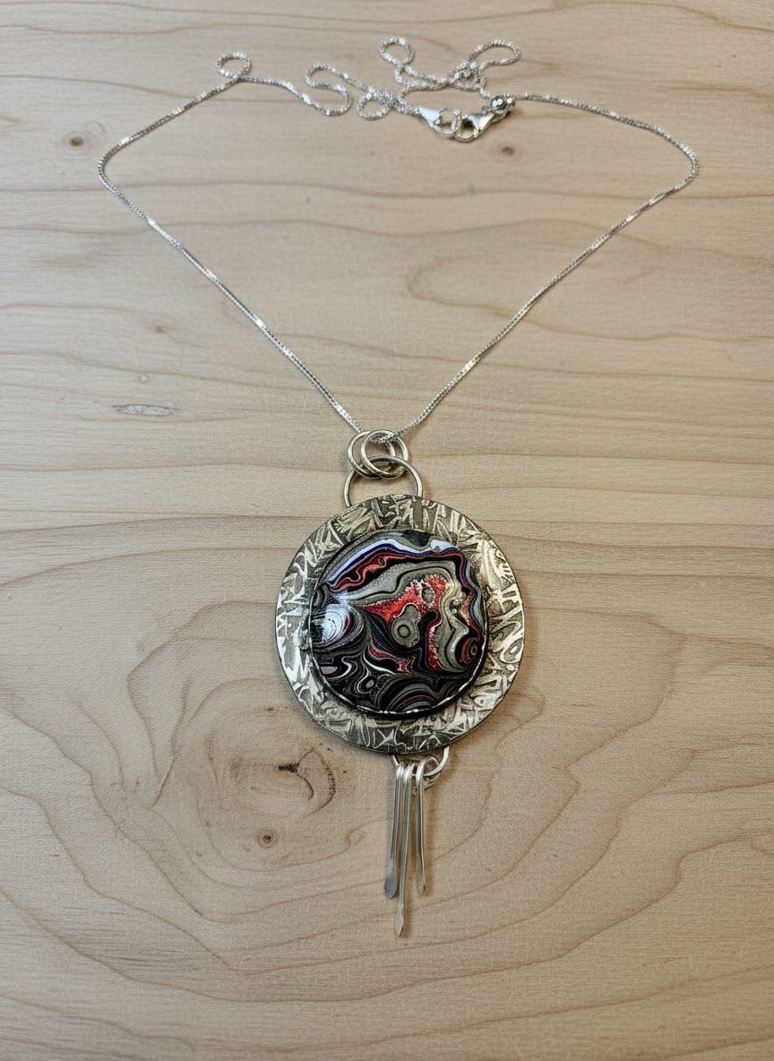 Painted by Time one-of-a-kind Fordite and sterling silver statement necklace handcrafted by Christine Keller.