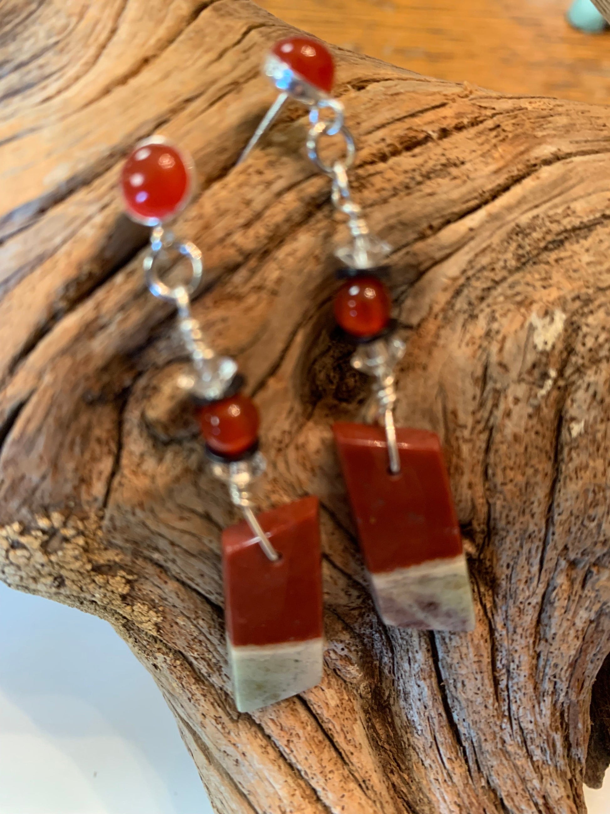 Sonoran Sunrise earrings on driftwood