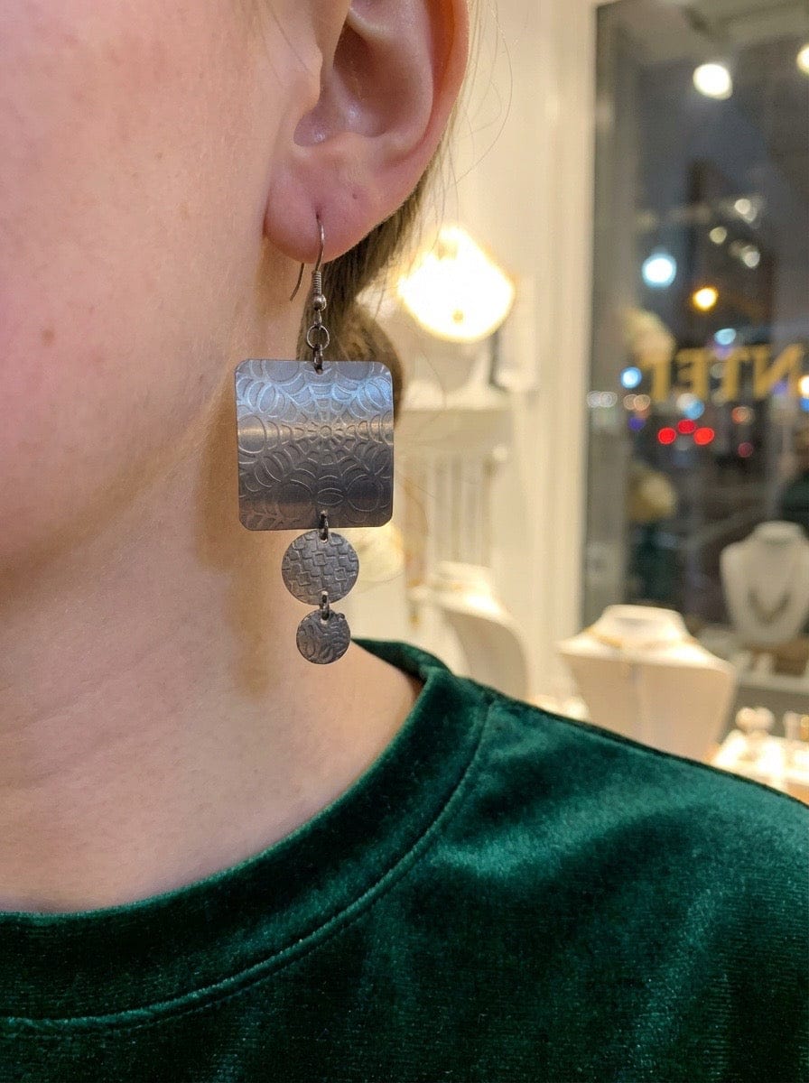 Web of Light – Textured Aluminum Statement Earrings
