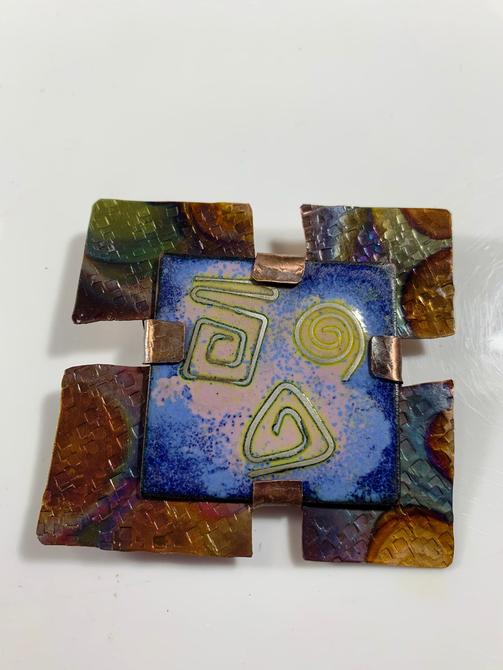 Abstract enamel brooch with copper accents