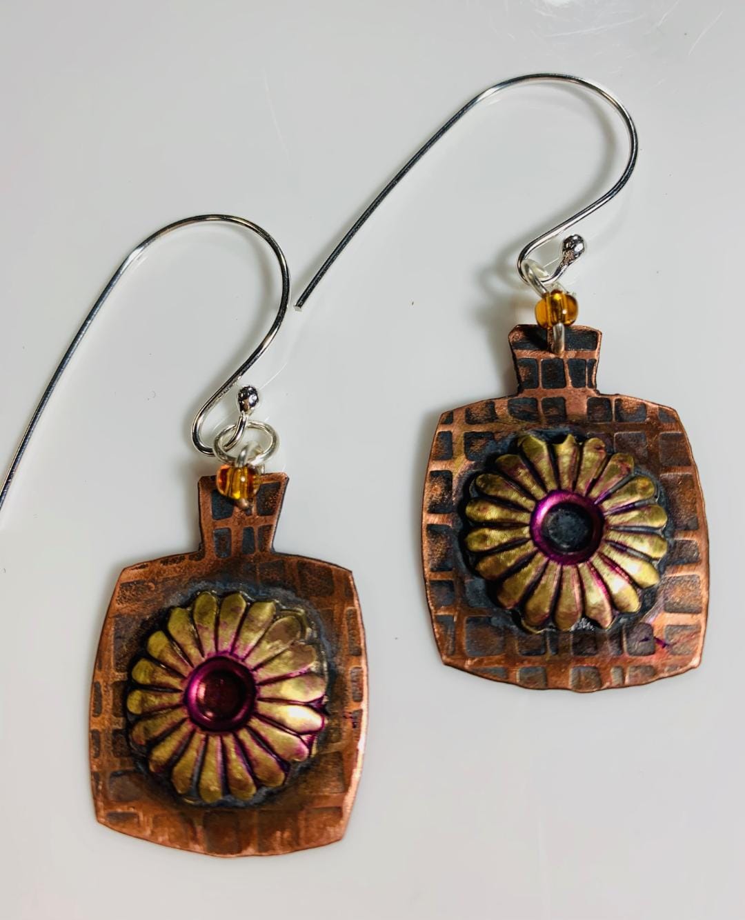 Copper flower earrings with silver hooks