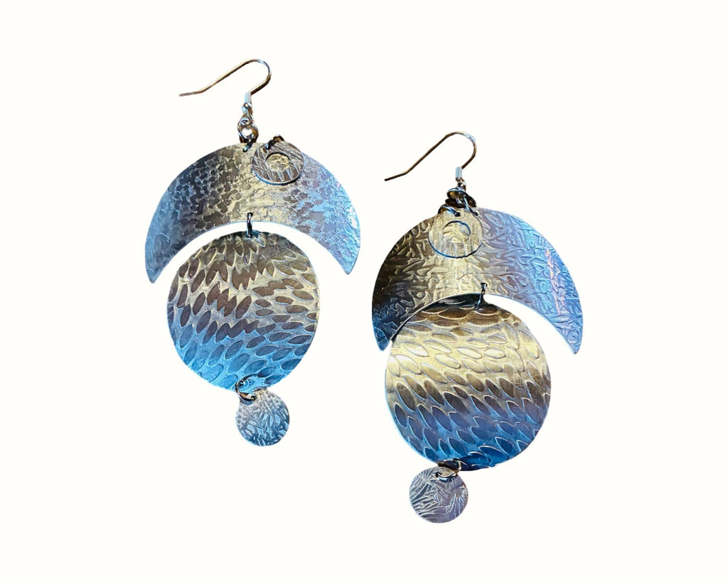 Handcrafted aluminum moon and circle statement earrings with textured metal design